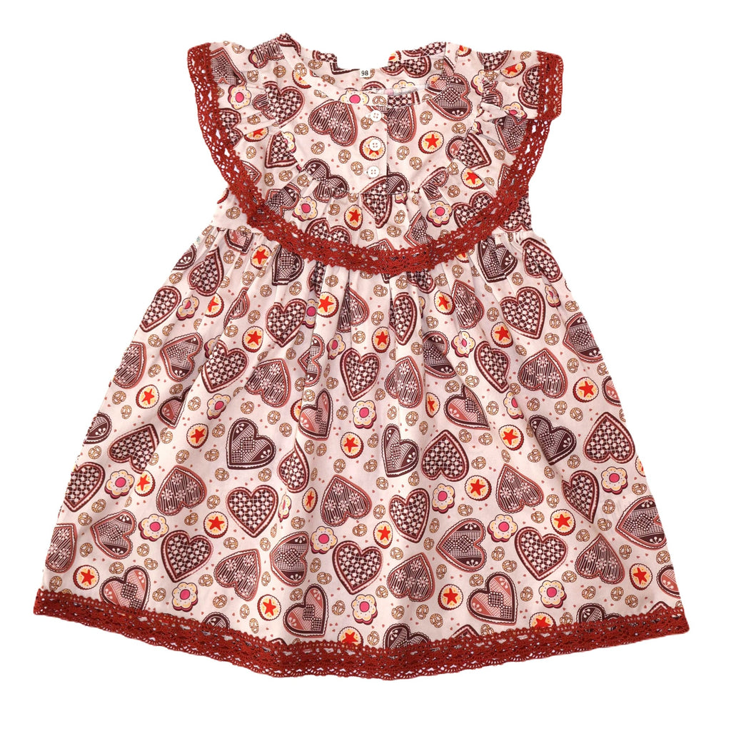 Girls' cotton dress Ginger, inspired by Czech gingerbread patterns, perfect for Christmas. Dívčí bavlněné šaty Perníček, inspirované vzory českého perníku, ideální na Vánoce, vyrobené z vysoce kvalitních švýcarských látek.